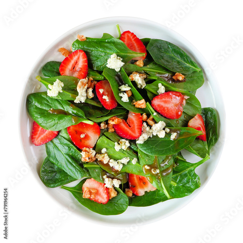 Summer salad of spinach, strawberries and blue cheese in a white plate isolated on a white background © Jenifoto