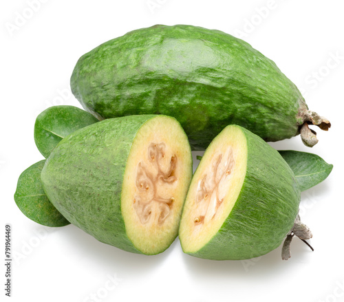 Feijoa fruits with leaves and feijoa cross sections isolated on white background.