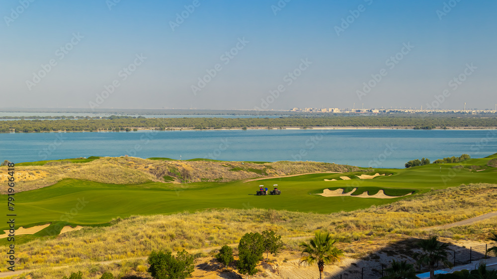 golf course and sea in Yas island Abu Dhabi city