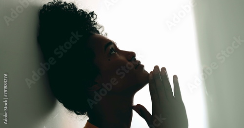 Картината върху платно One Religious young black woman in Prayer at home in quiet meditative contemplat