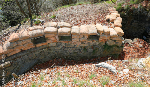 trench dug in the ground for the protection of soldiers of the army during the war from enemy attacks photo