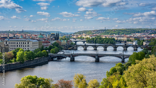 Old town of Prague. Czech Republic over river Vltava with Charles Bridge on skyline. Prague panorama landscape view with red roofs. Prague view from Letna Park, Prague, Czechia. photo