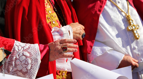 priest with a showy ring with precious stone during the blessing of the faithful