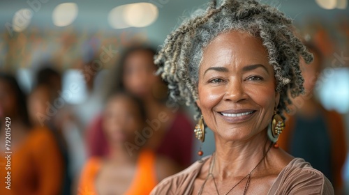 A photo of a smiling African-American woman with gray hair. © Vilaysack