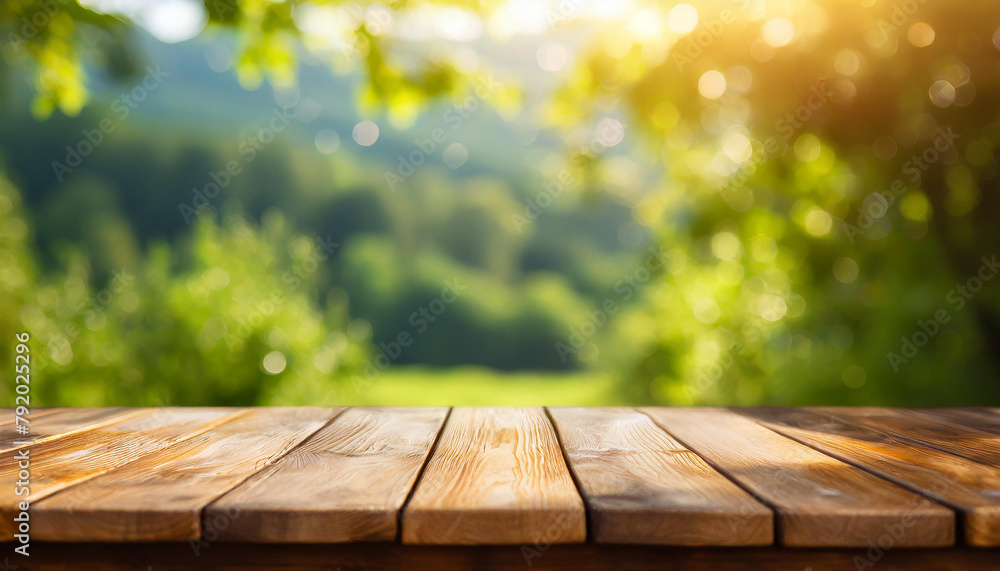 Empty wooden table. Mock up for product display. Green blurred nature on background. Empty wooden table. Mock up for product display. Green blurred nature on background.
