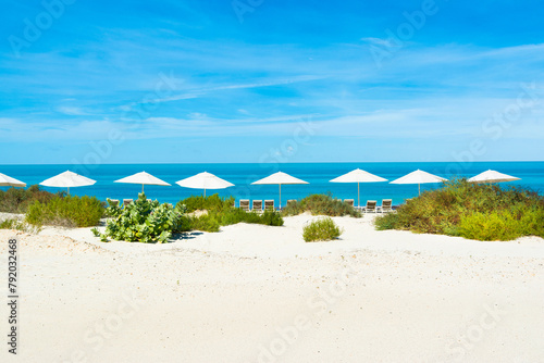 Beautiful landscape of clear turquoise ocean and sandy beach in Saadiyat island