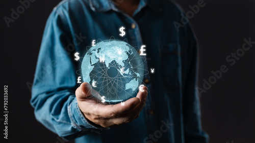 A person hold global currency to plan in e-business, the use of online digital network technology in business, buying and selling commerce online digital marketplace