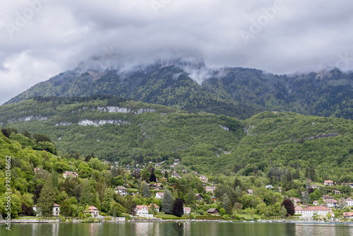 Scenic Lake Annecy beautiful mountains and coast - (French: Lac d'Annecy)