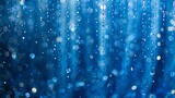 Blue curtains embellished with sequins create a sparkling, glittery background, perfect for holiday decorations or photo booth drapes