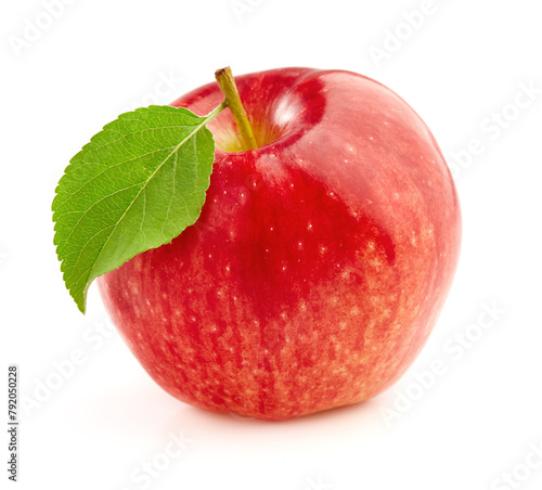 Red apple with leaf in closeup