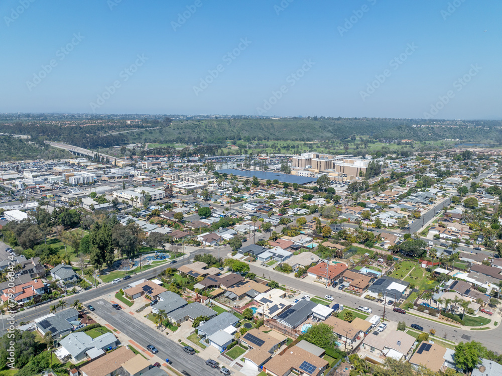 Fototapeta premium Aerial view of house with blue sky in suburb city in San Diego, California, USA.