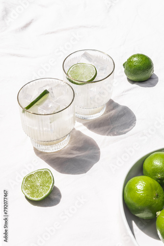 Margarita Soda Water Beverage Summertime Cocktail with Lime on Solid Bright White Background