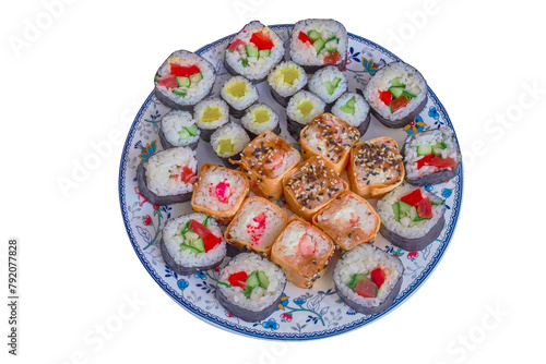 Plate of various sushi with fish,seafood, and white rice isolate on a white background.