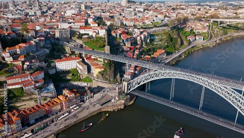 Drone view of cityscape view on the old town in Porto with Luis I Bridge over Douro river in Portugal photo