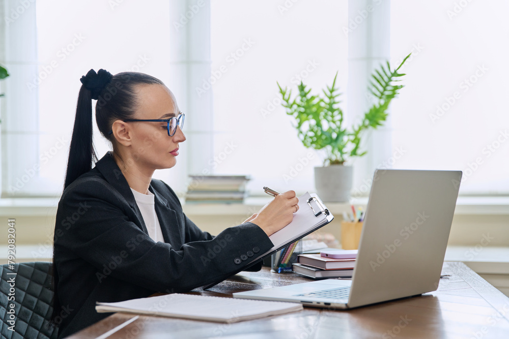 Woman psychologist mental therapist working remotely using computer for online therapy Woman psychologist mental therapist working remotely using computer for online therapy