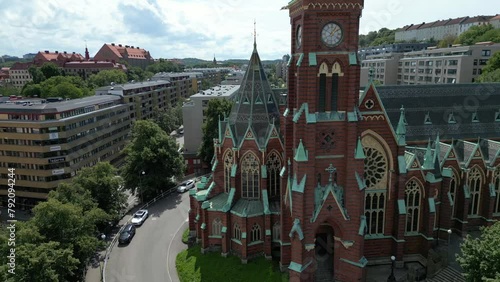 Aerial view of Oscar Fredrik Church - Gothenburg city in Sweden. Olivedal district landmark - Oscar Fredriks Kyrka (Oscar Fredrik Church). Neo Gothic architecture style. Drone recording. Cityscape photo