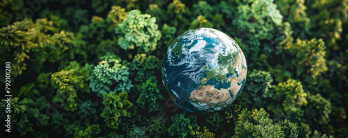 The image shows a realistic 3D rendering of the Earth floating above a lush green forest.