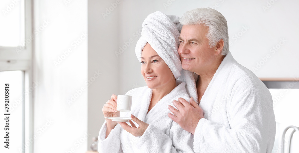 Morning of mature couple in bathroom Morning of mature couple in bathroom