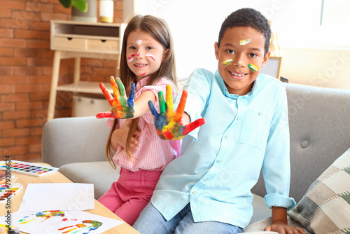 Cute little children in pai...