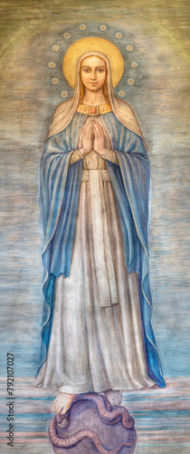 MILAN, ITALY - MARCH 7, 2024: The fresco of Immaculate Conception in the church Chiesa di San Vito in Gianbellino by Antonio Martinotti (1957).