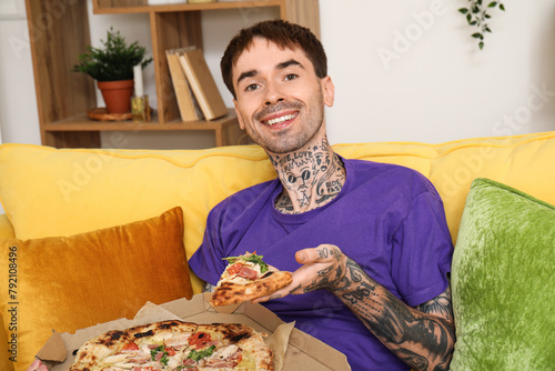 Handsome tattooed young man...