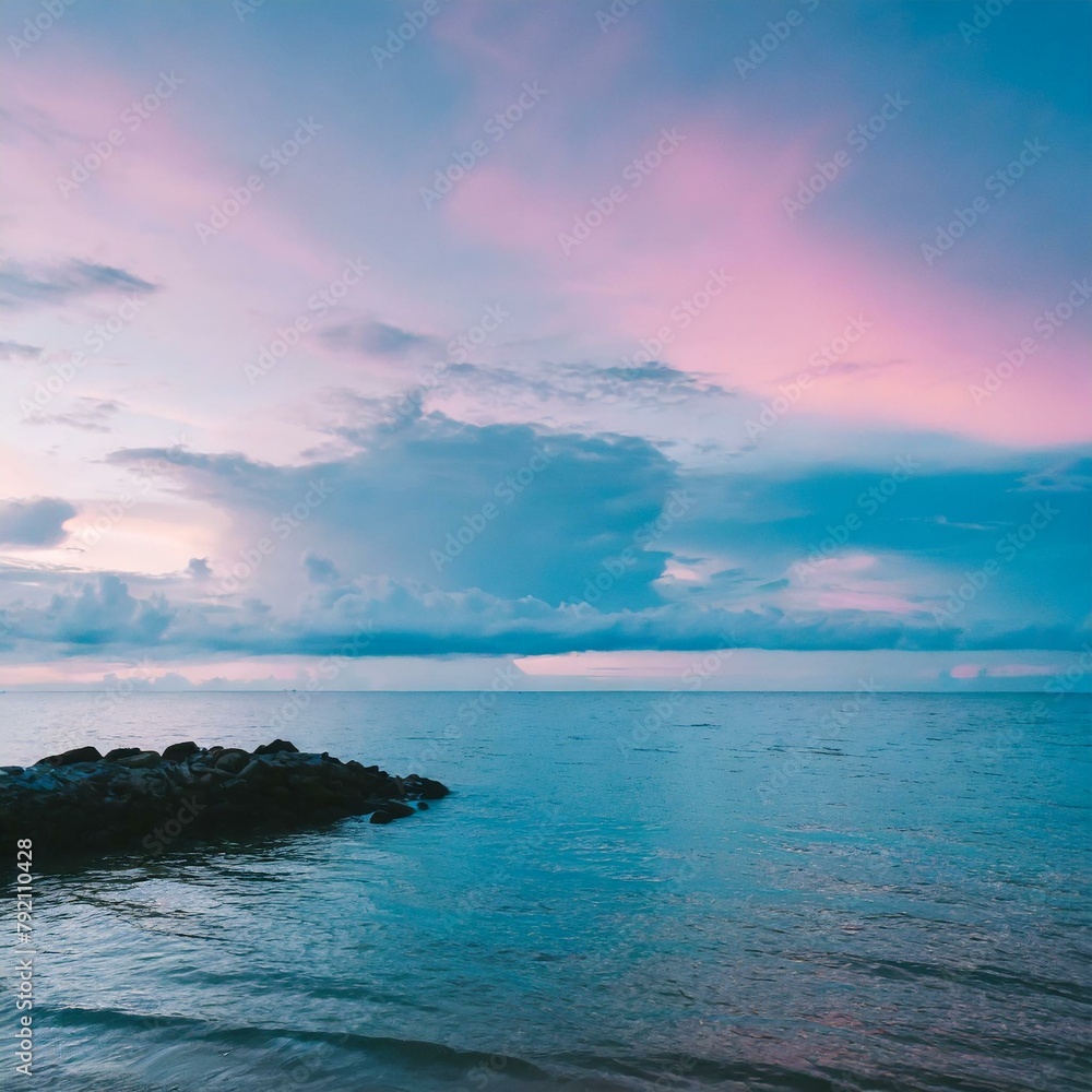 Fototapeta premium The Enchanting Blend of Blue Sea and Pink Sky