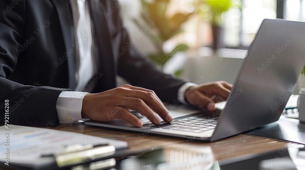 businessman downloading files or installing software on laptop cloud storage and cyber security concept businessman downloading files or installing software on laptop cloud storage and cyber security concept