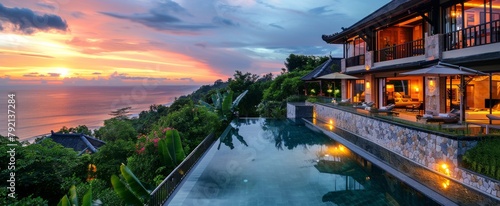 A Stunning Sunset Over the Ocean With a Pool