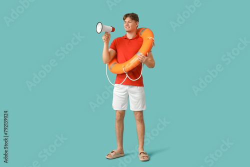 Male lifeguard with ring bu...