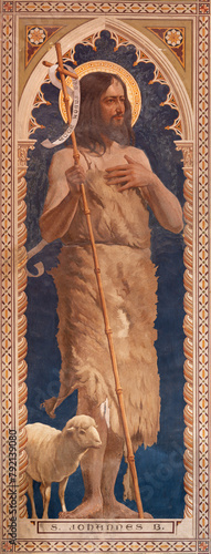 MILAN, ITALY - MARCH 6, 2024: The neo-gothic fresco of St. John the Baptist church Chiesa di Santa Maria del Carmine by Osvaldo Bignami from beginn of 20. cent. photo