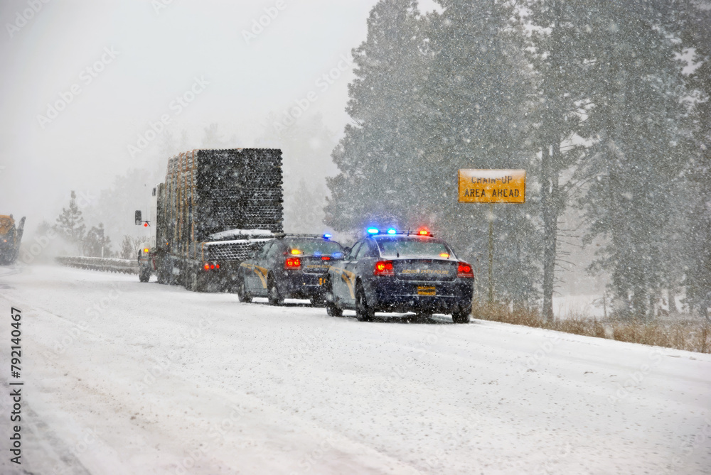 Police cars stop to assist Police cars stop to assist