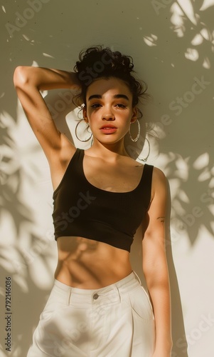 Woman in Black Top and White Shorts