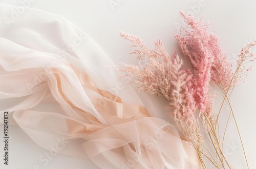 Pink Flowers Tied to a White Wall