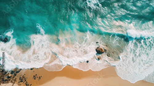 White sandy tropical beach with sea waves. Top view landscape image.