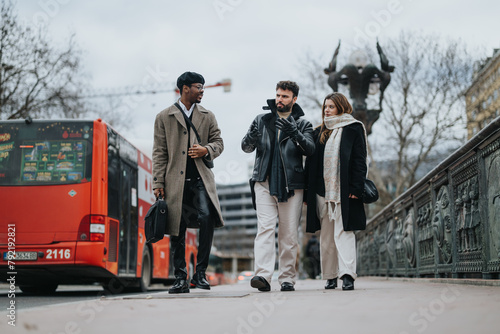 Multiethnic business team engaged in discussion while walking on city street with public transport and historical details in the background.