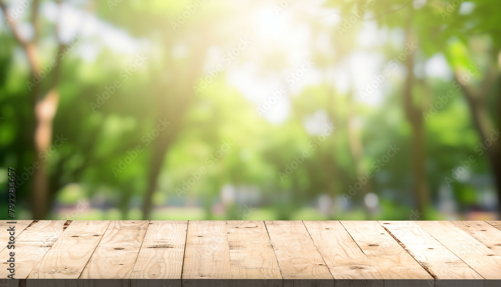 Wood table top on and blur natural and light background in the nature view Wood table top on and blur natural and light background in the nature view