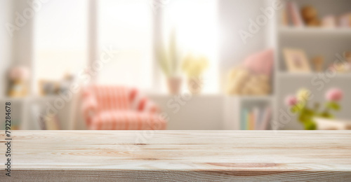 Empty wooden table in baby room interior