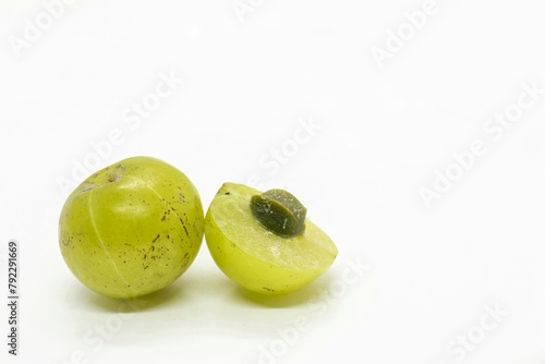 Closeup of Indian Gooseberry Fruit or Amla Fruit Isolated on White Background with Copy Space, Also Known as Emblica Myrobalan or Phyllanthus Emblica