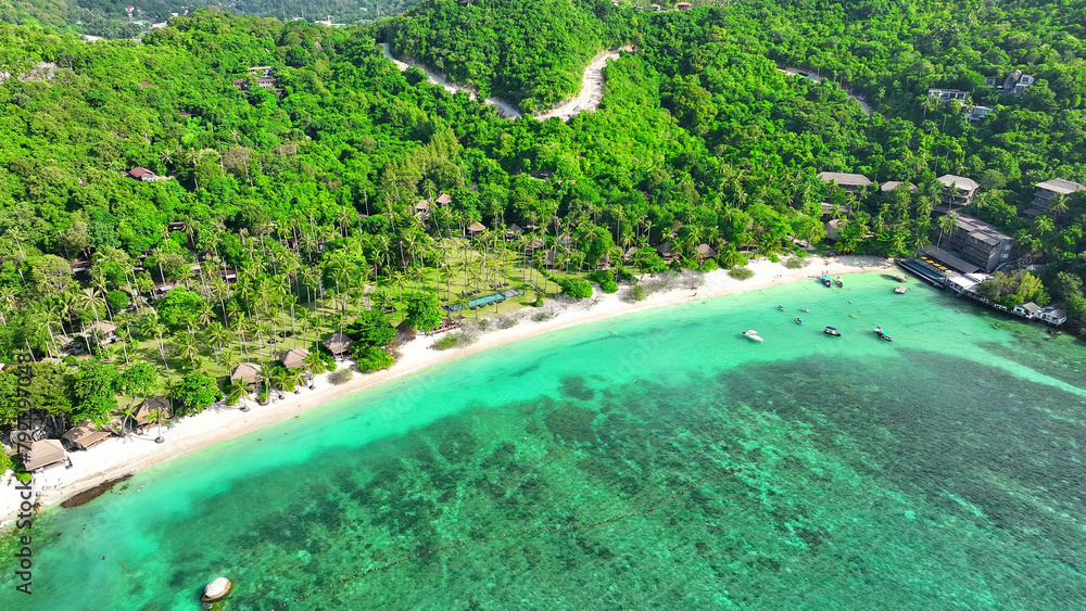 Discover paradise from a bird's eye view, pristine beaches, lavish resorts, lush greenery, and azure waters on a tropical island getaway. Aerial view. Tao island, Thailand. Nature background.
