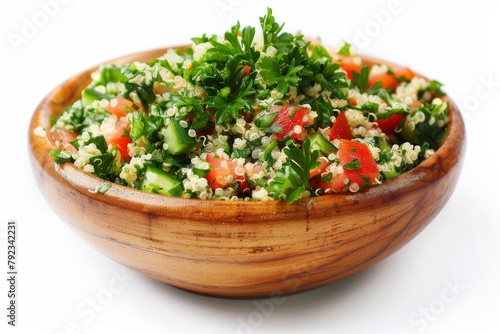 Quinoa and parsley salad with vegetables on white background