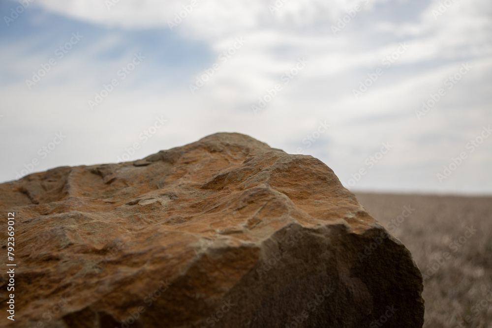 Textured Rock on Sandy Ground Textured Rock on Sandy Ground