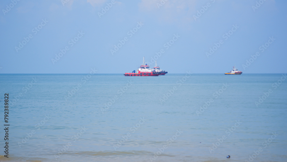 A Tanker And Ferry Anchored In The Middle Of The Sea On The Coast Of Tanjung Kalian, Indonesia