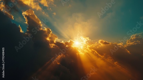 Close-up of sun rays breaking through the clouds as the sun rises on the horizon