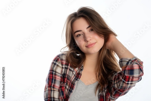 Young woman with a casual style photographed in a studio against a white background