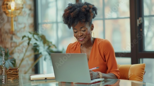 Entrepreneur Working on Laptop photo