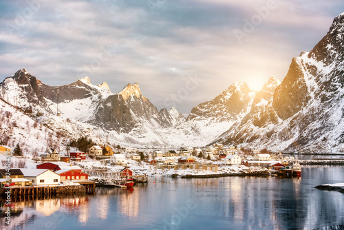 Tranquil fishing village in snow valley on winter