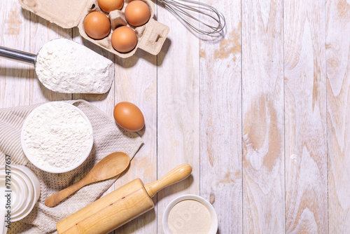 Homemade dough recipe on a wooden table top view