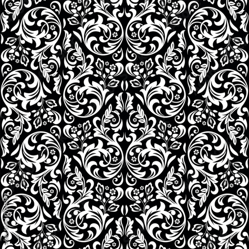 Wallpaper in the style of Baroque. Seamless vector background. White and black floral ornament. Graphic pattern for fabric, wallpaper, packaging. Ornate Damask flower ornament.