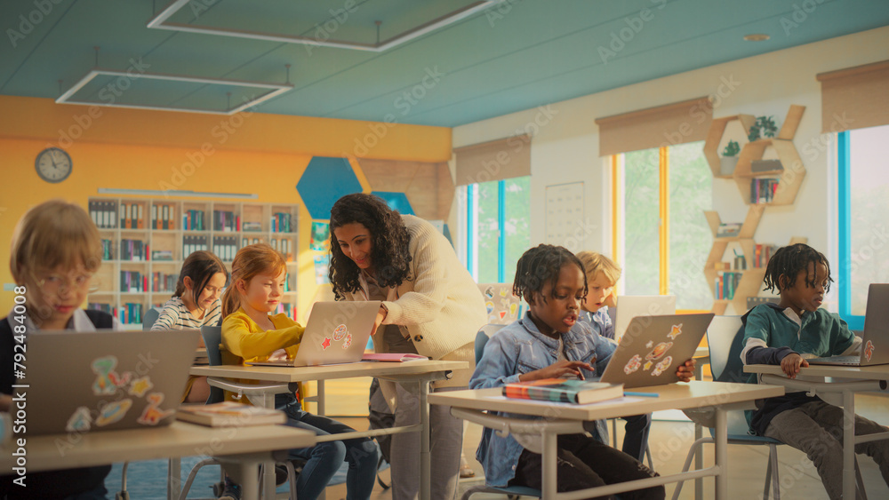 Class of Young Multiethnic Children Using Laptop Computers while ...