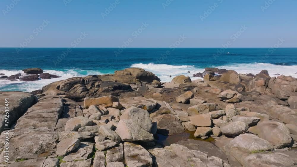 Waves Crash On The Rocky Seacoast Of Muxia Coast, Galicia In Spain. Aerial Drone Shot Waves Crash On The Rocky Seacoast Of Muxia Coast, Galicia In Spain. Aerial Drone Shot